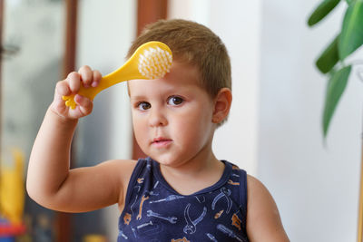 Portrait of cute boy at home