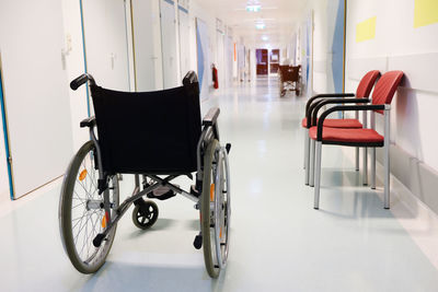 Wheel chair in the hospital corridor. healthcare concept