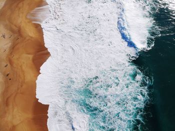 Aerial view of waves at beach