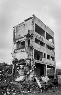 Abandoned building against sky