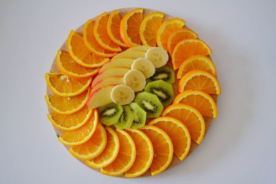 High angle view of oranges on white background