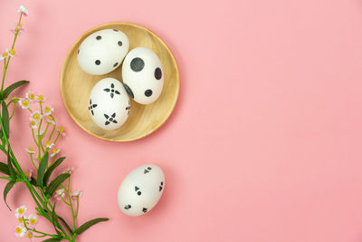 High angle view of eggs in plate on table