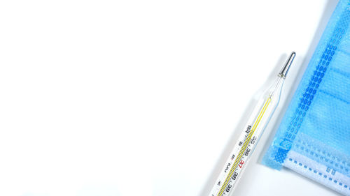 Close-up of a pen over white background