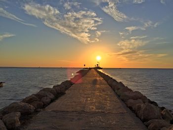 Scenic view of sea at sunset