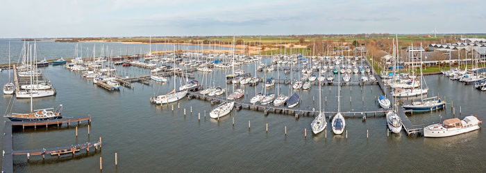 Boats moored at harbor