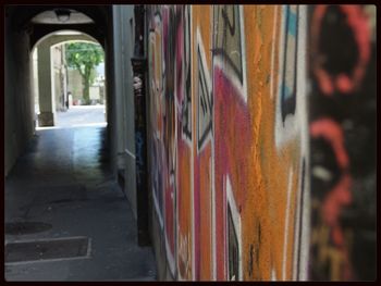View of road along buildings