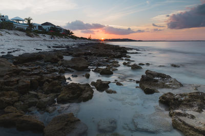 Scenic view of sea against sky at sunset