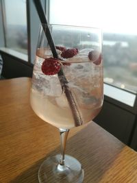 Close-up of wineglass on table