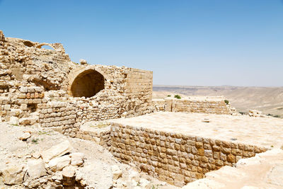 View of old ruin building against sky