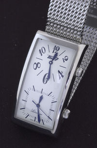 High angle view of wristwatch on table