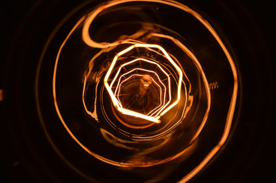 Close-up of illuminated light bulb