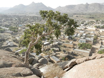 High angle view of townscape against mountains