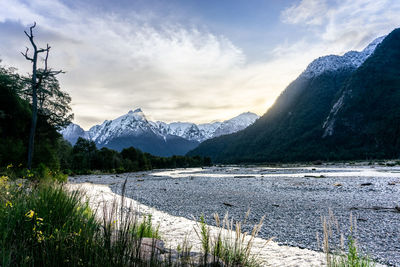 Scenic view of snowcapped mountains against sky