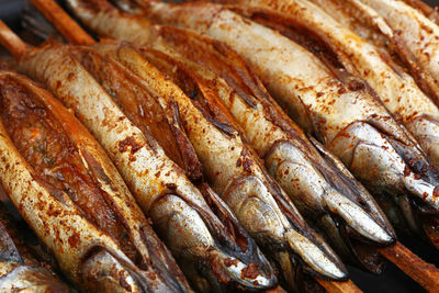 Full frame shot of fish on barbecue grill