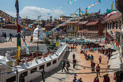 Peope at  boudha stupa, one of the largest stupas in the world in the city of kathmandu in nepal