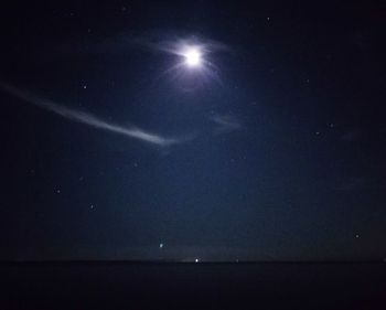 Scenic view of sea against sky at night