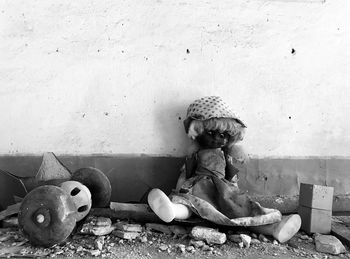 Toy sitting on wall