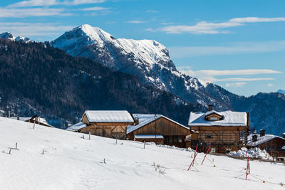 Winter magic. the ancient wooden houses of sauris di sopra. italy