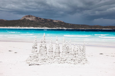 Scenic view of beach against sky