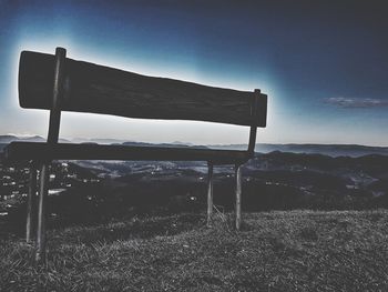 Built structure on landscape against sky