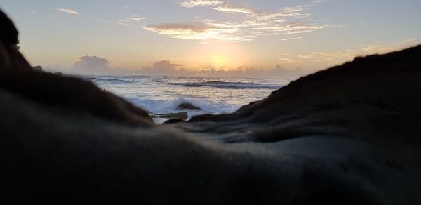 Scenic view of sea against sky during sunset