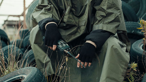 Soldier seeks radio contact in radioactive area