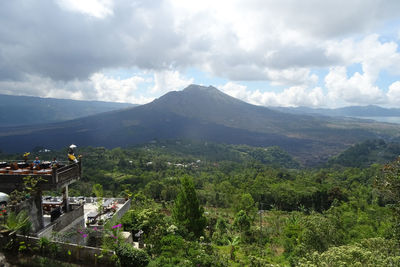 Scenic view of landscape and mountains against sky