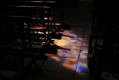 Chairs in illuminated room