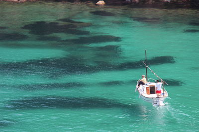 Boats sailing in sea