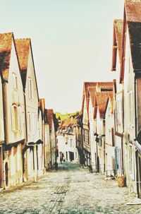 Narrow alley along buildings