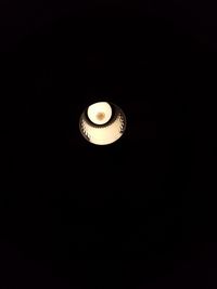 Low angle view of illuminated light bulb