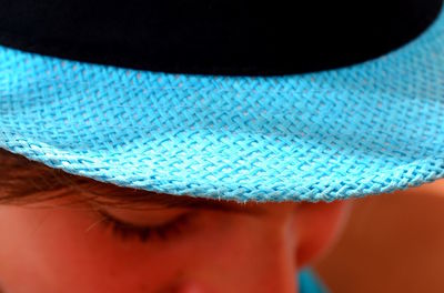 Close-up of woman wearing hat