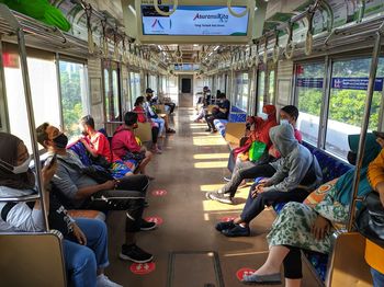 Group of people sitting in bus