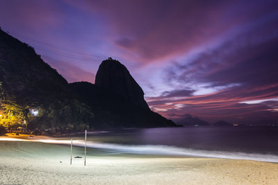 Beautiful pink and blue sunrise view from beach front to sugar loaf