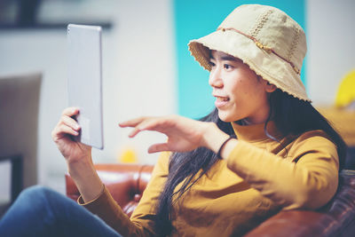 Young woman using mobile phone