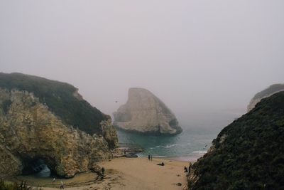 View of sea against mountain