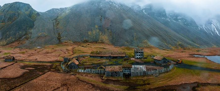 Aerial view of a viking village on a stormy rainy day in iceland.