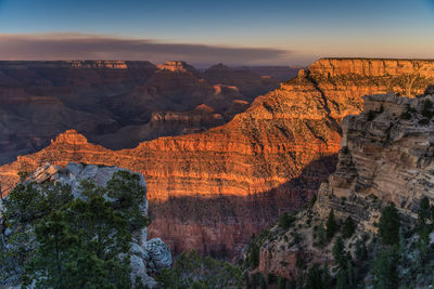 Scenic view of rock formations against sky