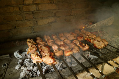 Autumn leaves on barbecue grill