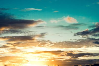 Low angle view of dramatic sky during sunset