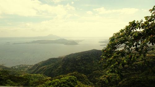 Scenic view of sea against cloudy sky
