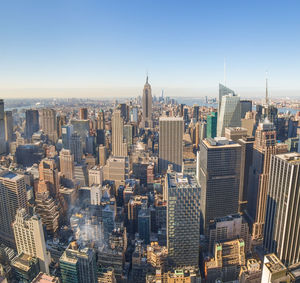 High angle view of city buildings against sky