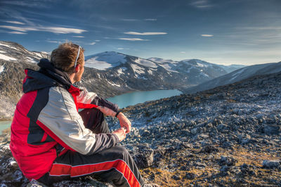 Man sitting in mountains