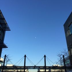 Low angle view of built structure against clear blue sky