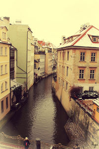 View of canal along buildings