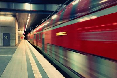 Train moving on railroad station platform