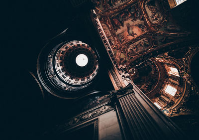 Low angle view of illuminated building at night