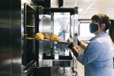 People working in kitchen