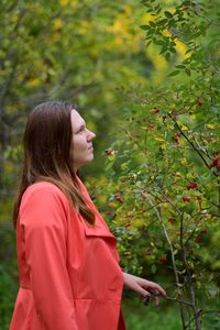 Woman looking at tree