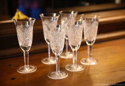 Close-up of wine glasses on table